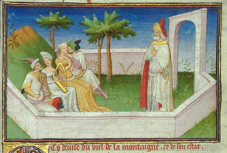 A medieval illustration depicting figures in an outdoor setting, with a man in a red cloak and hat on the right, surrounded by several people playing musical instruments and engaging in conversation.