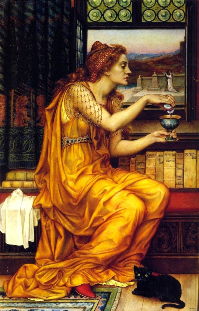 A woman in a yellow dress sits, preparing a potion in a goblet, with a black cat nearby. She is in an indoor setting with books in the background and a window showing a distant scene.